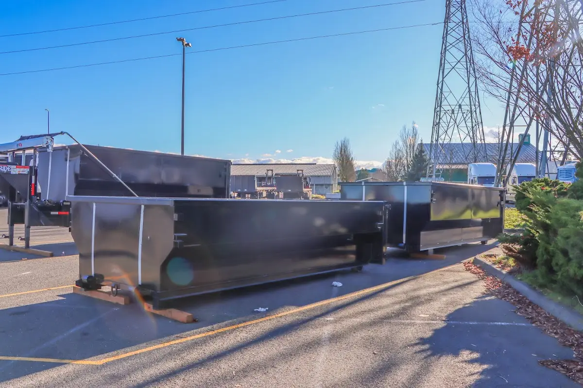 Roll-off dumpster ready for waste disposal at job site for 3 Yard Dumpster Rental in Butler